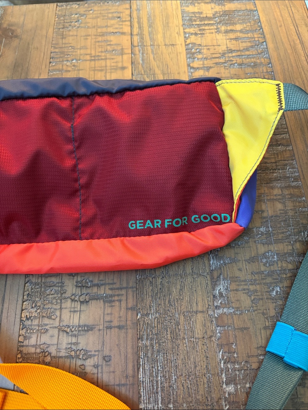cotopaxi Waist Pack in Purple, Red & Yellow - Picture 4 of 5
